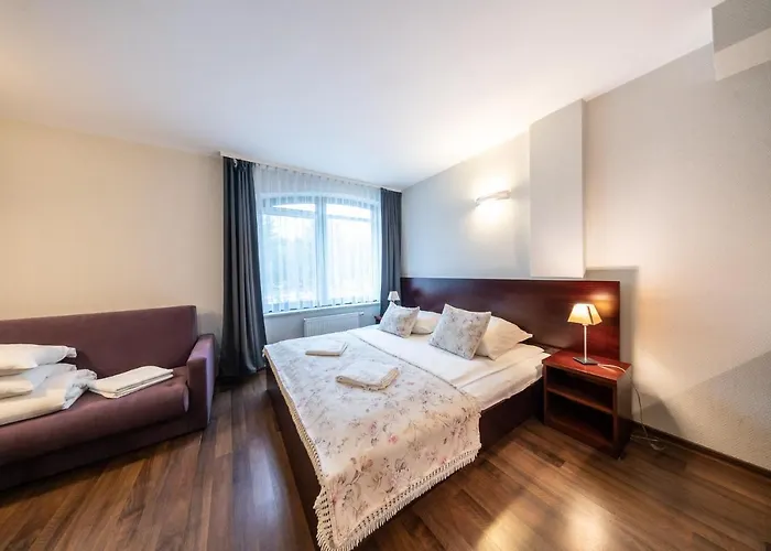 Pokoje i apartamenty ,,Leśne Jastarnia